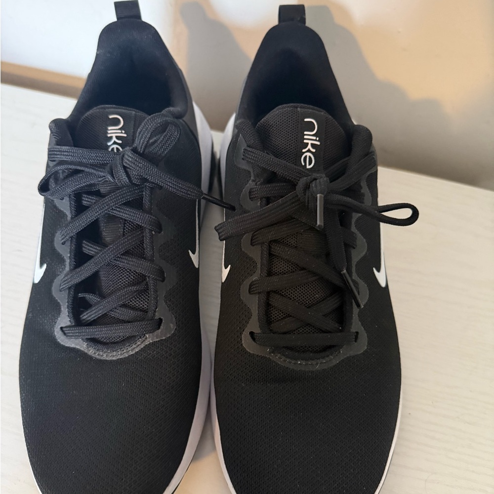 Nike women’s  Black Athletic Running Shoes with White Swoosh